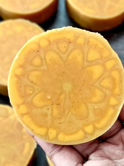 A close-up of a kaleidoscope soap, revealing the intricate, subtle pattern created by the ghost swirl.