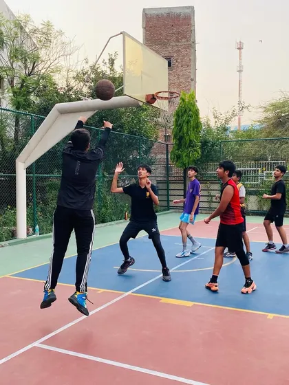 A player takes a jump shot from the elbow, a key area on the court to master.