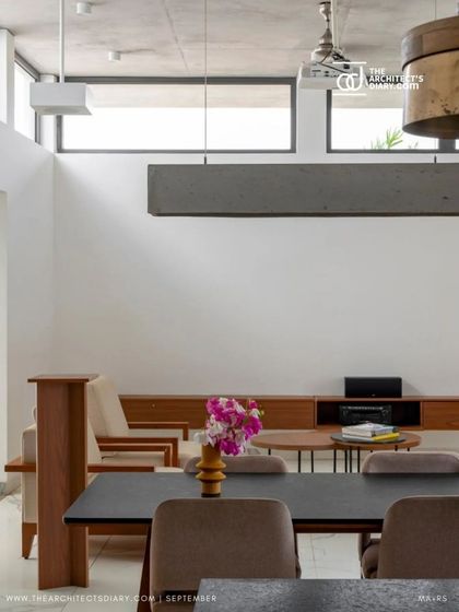 Our SAMAM House project was featured by The Architect's Diary. The feature highlights the home's double-height living and dining space with its exposed concrete ceiling and minimalist aesthetic.