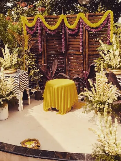 A simple yet beautiful Haldi setup on a home terrace, proving that intimate celebrations can be just as special.