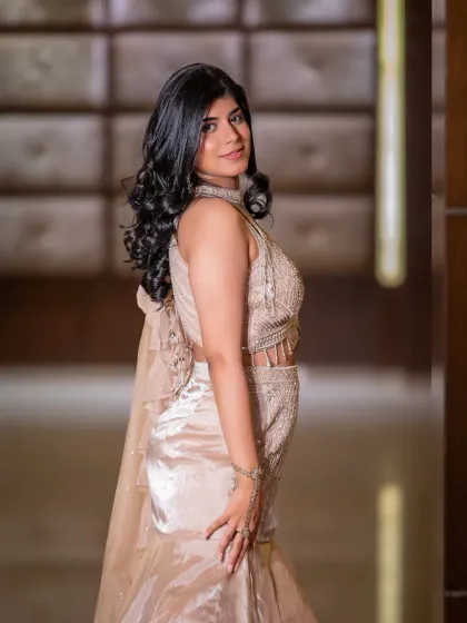 A beautiful portrait of the newly engaged bride-to-be. Her happy expression and elegant pose perfectly capture the excitement of the moment.