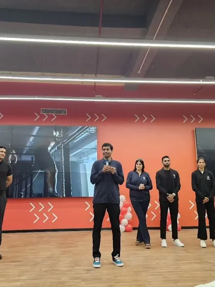Various moments capturing Pullela Gopichand's presence at our events, interacting with partners, students, and our team.