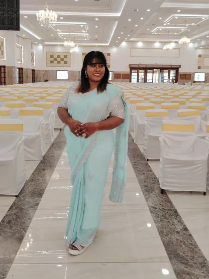 My first time wearing a saree for an event, and I loved it. This was taken in a large, empty auditorium before the guests arrived.