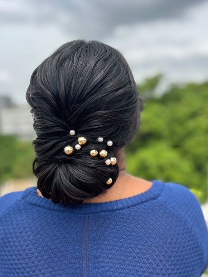 Dakshayini - Hairstyling Academy & Workshops Elegant Buns & Updos photo 4