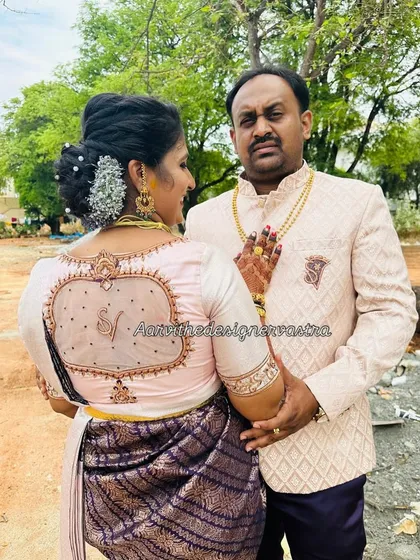 It's all in the personal details. For this beautiful couple, I added their initials 'S' and 'V' into the blouse design, a unique touch that makes the outfit truly one of a kind.