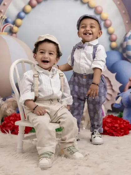 Double the giggles, double the fun! We love capturing the special bond between siblings, and this whimsical carnival-themed shoot was the perfect setting for these two dapper little brothers.