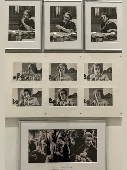 A collection of black and white photographs capturing various moods and moments of Indira Gandhi at her desk. This display personalizes a powerful political figure, showing her in moments of contemplation, work, and engagement.