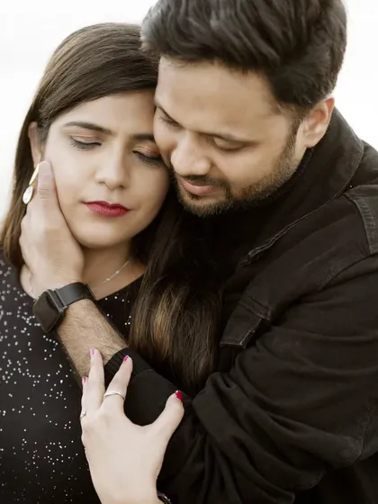 A close, comforting embrace that speaks volumes. This shot highlights the protective and gentle nature of their bond, creating a powerful and emotional portrait.