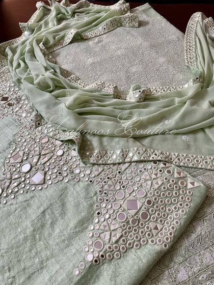 A close-up of the palazzo and kurta, showcasing the different textures of Chikankari and mirrorwork.