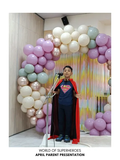 A student presents his superhero project, combining public speaking with his passion for comics.