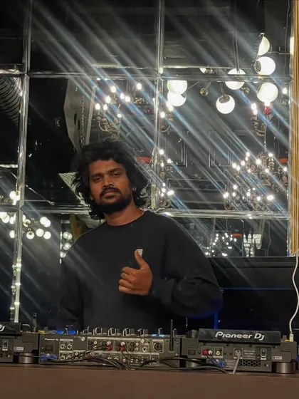 A thumbs up from the DJ booth. Ready to rock the party with my top-of-the-line equipment.