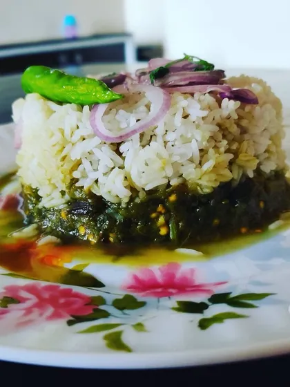 This is my beautifully plated Bihari Palak Saag with rice, a healthy and tasty dish that represents my passion for authentic, home-style cooking.