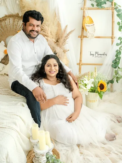 A full-length portrait capturing the couple in a beautifully styled, light-filled setting, creating a memory that is both serene and joyful.