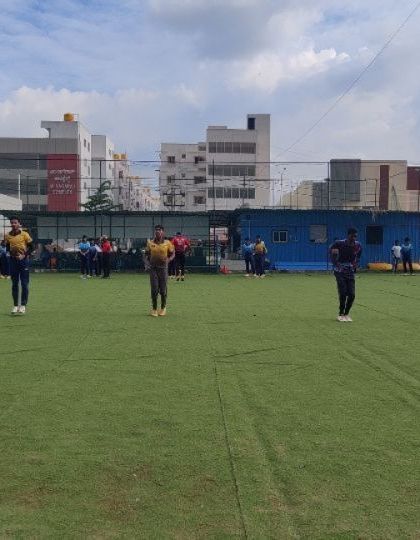 Players practicing their balance and coordination during a warm-up. These simple exercises are vital for overall athleticism.