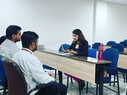 This is what a mock interview session looks like. We practice in a realistic setting so you can learn to manage nerves, answer tough questions, and get comfortable with what to do with your hands.