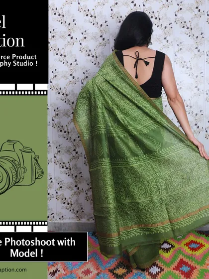 A model showcasing the back of a green printed saree. This view is important for customers to see the full pattern and the blouse design.