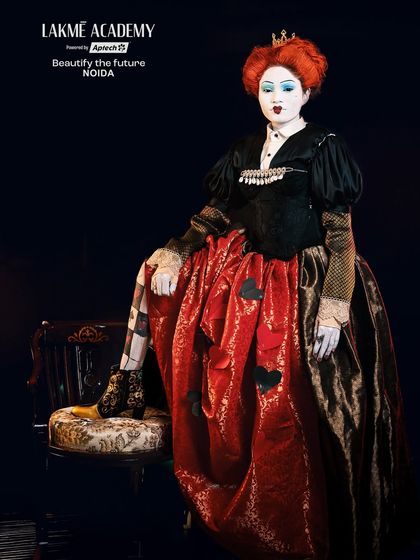 The full costume and pose of the Queen of Hearts. We encourage students to fully embody the characters they create for their portfolios.