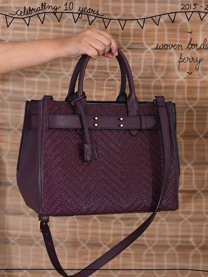 The structured Perry tote bag is transformed by our Woven Edit. This version in a deep Woven Bordeaux leather shows how hand-weaving adds a layer of texture and sophistication to a classic work-to-weekend bag.