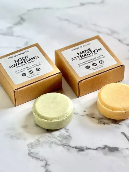 Our solid shampoo bars are a sustainable game-changer for your hair care routine. Each bar lasts for 40-60 washes, replacing up to 750ml of liquid shampoo. We have two variants: 'Root Awakening' with Kokum Butter for oily scalps and 'Mane Attraction' with Mango Butter for dry hair, both packed in 100% compostable boxes.
