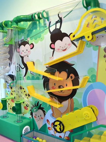 A closer look at our interactive ball wall contraption. It's a fantastic sensory and learning tool that keeps kids fascinated as they figure out how it works.