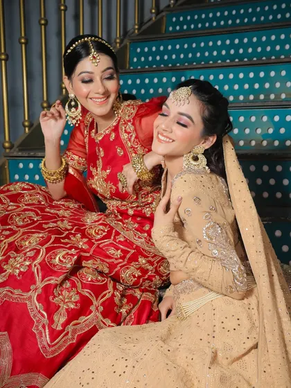 Capturing the joy of a celebration. Here, I created complementary makeup looks for these two lovely ladies, focusing on radiant skin and defined eyes that enhance their features for a festive occasion.