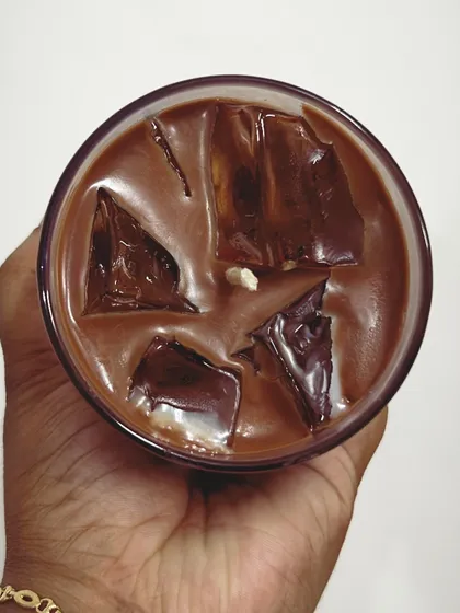 We finally tried our hands on the viral iced coffee candle, and it looks absolutely delicious. It smells just as good as it looks.