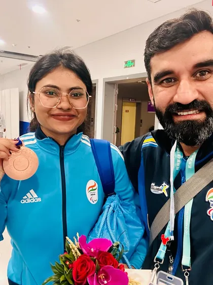 Celebrating a bronze medal win at the Asian Para Games. Her hard work and spirit are an inspiration.