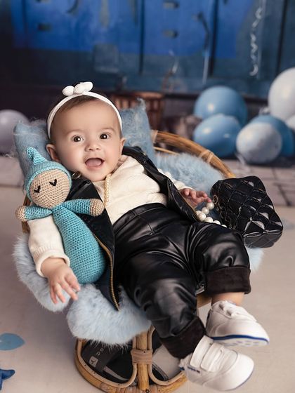 Relaxing in her chair with her favorite doll, this little boss is in charge. I love creating these detailed scenes that allow for so many different poses and expressions.