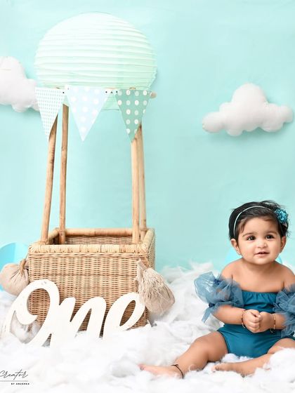A sweet and simple portrait from the hot air balloon series. The focus is all on her beautiful face and curious eyes.