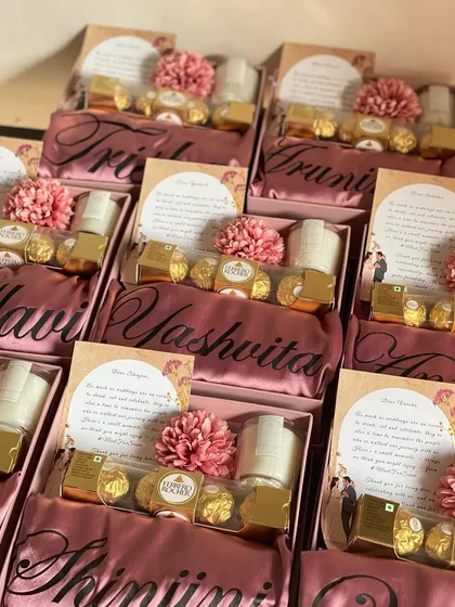 Another look at the simple yet elegant bridesmaid hamper, featuring a personalized robe, scented candle, and Ferrero Rocher. Perfect for a bachelorette party gift!