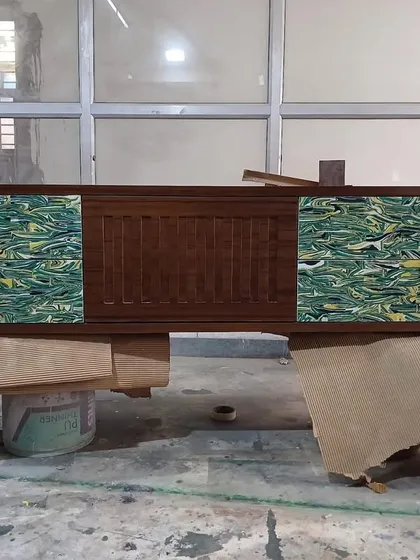 Another view of the sustainable console table, highlighting the contrast between the dark wood frame and the unique recycled panels. This is where conscious crafting meets artistic expression.