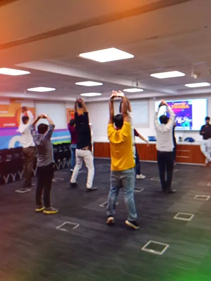 Starting the session at Indus Towers with a good stretch. Every corporate workout I lead includes a proper warm-up to prepare the body and prevent injuries.