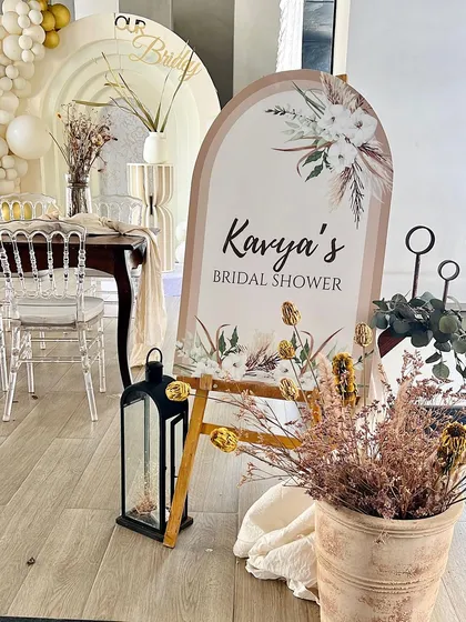 For this boho-themed bridal shower, we focused on natural textures and a neutral color palette. The setup included a custom welcome sign, dried flowers, and pampas grass to create a chic and relaxed atmosphere for the celebration.