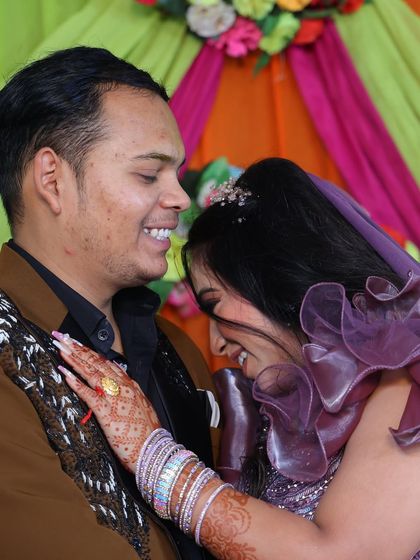 A candid, happy moment from an engagement ceremony.