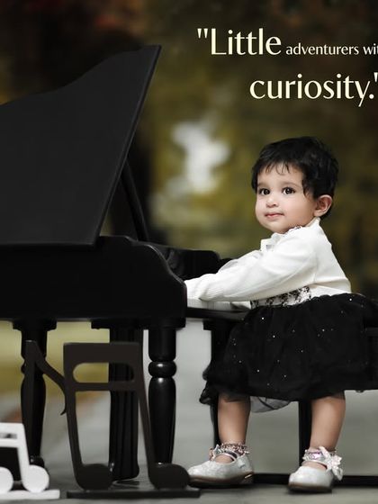 Little adventurers with endless curiosity. A stylish girl plays the piano in a beautiful outdoor setting.