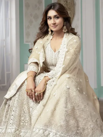 A full-length view of this elegant look, showing how the makeup and hair work in harmony with the outfit. Our students are trained to create cohesive and polished final looks.