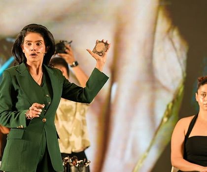 On stage in Bengaluru, explaining a product during a live demo. My goal is to educate and empower artists with deep product knowledge.