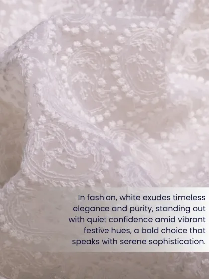 In fashion, white exudes timeless elegance and purity. This close-up shows the delicate tone-on-tone embroidery that gives the fabric a serene sophistication.