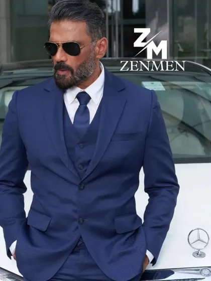 A classic navy blue 3-piece suit is a wardrobe essential. I tailored this piece for a timeless, powerful look, proving that true style is effortless.
