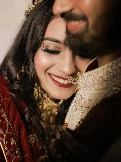 It's these unscripted, in-between moments that I love the most. Here, a bride's joyful, genuine smile is captured as she leans into her partner, showcasing the pure happiness and comfort you share.