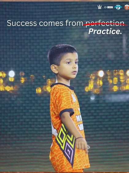 Success comes from practice. A young player embodies this motto, focused and ready to learn.