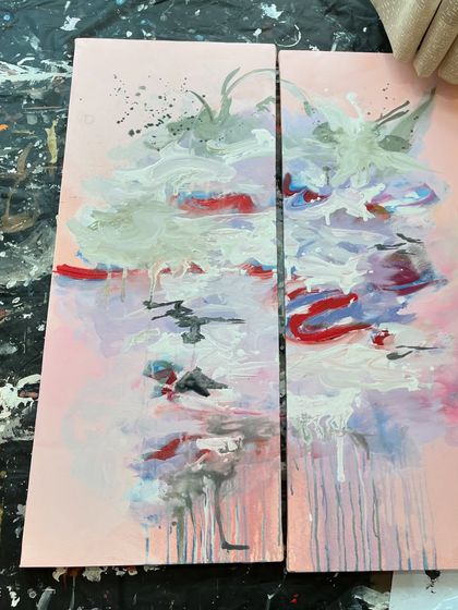 The pink abstract diptych laid out on my studio floor. This is how I often work on large pieces, allowing me to see the whole composition at once.