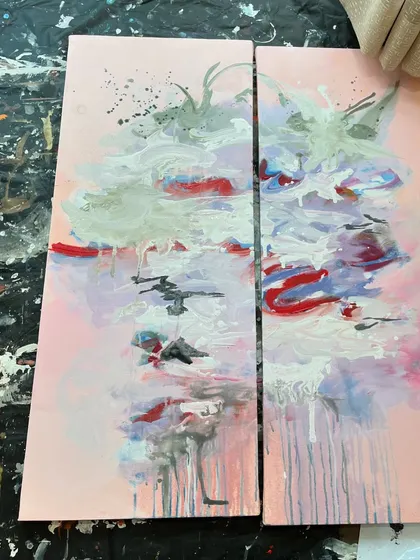 The two panels of the abstract pink diptych laid out in my studio. This shows how I work on multi-panel pieces to ensure they flow together seamlessly.