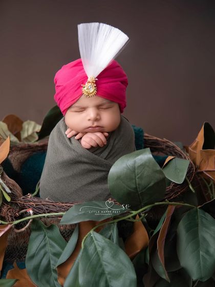 A little Sikh prince in his first turban. This is more than a photo; it's a celebration of heritage and identity. I handle these sessions with the utmost respect, creating a portrait of pride for your family.