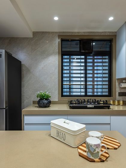 A detail shot of the Filigree House kitchen, where minimalist charm meets modern comfort. The neutral color scheme and clean lines create a serene setting that is perfect for cooking and gathering.