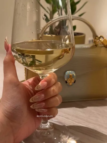 The trending butter yellow color, here in a subtle and chic French manicure. It’s a sophisticated way to wear a trendy shade, perfect for any occasion.