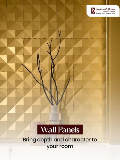 These golden, geometric wall panels bring incredible depth and character to this room. The metallic finish catches the light beautifully, creating a dynamic and luxurious feature wall that serves as a piece of art.