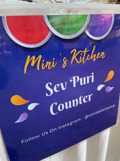 A custom sign for the Sev Puri counter at a Holi event. Clear and festive branding helps guests navigate the food stations easily.