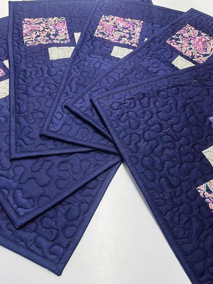 A close-up showing the quilting on the placemats.