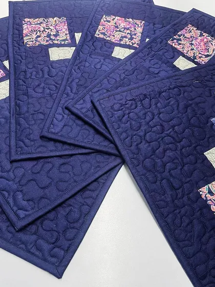 A close-up showing the quilting on the placemats.